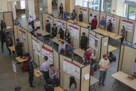 M.Eng. poster session participants display their posters in Duffield Hall